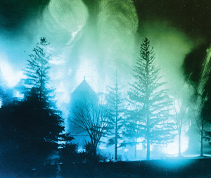 flames light up the night sky as main engineering building burns in November 1918