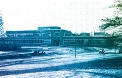 exterior view of a research building circa 1960