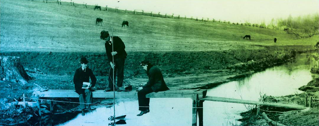 engineering students taking stream measurements circa 1890
